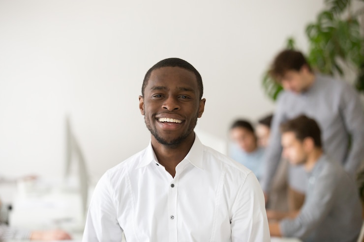 happy-african-american-professional-manager-smiling-looking-camera-headshot-portrait_1163-5134