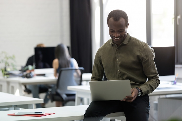 https://motivated-counseling.com/wp-content/uploads/2022/09/happy-afro-american-businessman-sitting-his-desk-typing_171337-7278.jpg